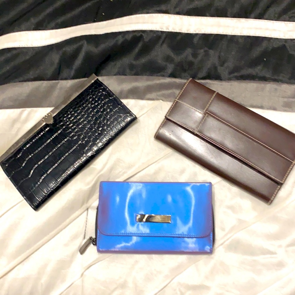 Bundle of wallets 🖤💜🤎